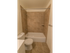 Model bathroom with vanity sink, toilet and tub shower at Wyntre Brooke apartments in West Chester, PA.