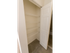 Model bedroom closet with utility shelving at Wyntre Brooke apartments in West Chester, PA.