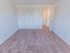 Carpeted model bedroom at Polo Ridge apartments in Burlington, NJ.