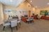 Interior of the leasing and management office furnished with desks and chairs at Rosetree Crossing Apartments in Media, PA.
