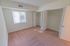 Carpeted model bedroom with large double closets at Paoli Place Apartments in Paoli, PA.