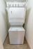 In-unit stacked washer and dryer at Paoli Place Apartments in Paoli, PA.