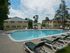 Community swimming pool and sun deck at Paoli Place Apartments in Paoli, PA.