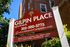 Charming Gilpin Place Apartments sign against a backdrop of lush greenery, offering modern living in Wilmington.