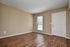 spacious living room with hardwood floors at Silver Springs Apartments in Springfield MO