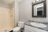 bathroom with white cabinets at Eastview Apartments in Springfield MO