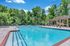 Sun Deck, Shades, and Swimming Pool | Deacon's Station Apartments | Wake Forest Off-Campus Housing