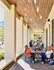 Student apartments with restaurants and retail nearby Auburn. Inviting outdoor patio with stylish seating and warm ambiance, perfect for social gatherings and relaxation.