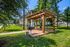 Community BBQ Grills in shaded patio | Urban Oaks | Conroe, TX Apartments
