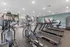 Modern fitness center with state-of-the-art cardio equipment and a sleek, inviting design.