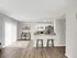 Model Living Room Looking Into Kitchen & Dining