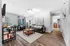 Modern living room with sleek furniture, stylish decor, and abundant natural light creating a cozy atmosphere.