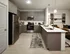 Modern kitchen with sleek cabinetry, stainless steel appliances, and a spacious open-concept living area showcasing chic artwork and comfortable seating.