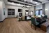 Elegant open-plan living area with modern decor, featuring cozy seating, a stylish dining table, and abundant natural light.