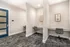 Contemporary workspace area featuring sleek chairs and minimalist design in a modern apartment setting.