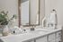 Elegant bathroom design with a sleek quartz countertop, modern fixtures, and stylish decor elements at Legends at Laurel Canyon.