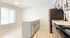 Bright modern kitchen with sleek appliances, ample cabinetry, and a sunlit dining area for delightful meals.