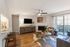 Newly Renovated Living Room with Hardwood-Style Flooring