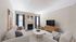 Relax in a living room that blends comfort with contemporary style