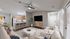 Open floorplan kitchen/living room with modern hardwood style flooring.