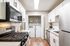 Newly Renovated Kitchen with Gas Stove and In-Home Washer & Dryer