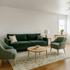 Inviting living room featuring a stylish green sofa set with a matching armchair, centered around a chic wooden coffee table on a leaf-patterned rug.