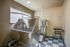 Pet wash center with two stainless steel pet wash stations and large window