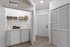 Utility room with full size washer and dryer