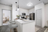 Kitchen with Vinyl floors, stainless-steel appliances, white quartz countertop, and pendant lighting.