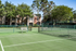 Tennis court with bench
