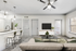 Living room with couch, TV, coffee table, and ceiling fan