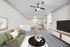 Living room with couch, TV, coffee table, and ceiling fan