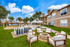 exterior resident area with fire pit, chairs, and oversize chess board