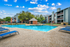 Dual pool feature with sundeck and lounge chairs