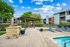 Sundeck, brick grill, and overed sitting area