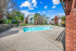 Dual pool feature with sundeck and lounge chairs