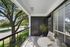 Balcony with wooden furniture looking over greenery