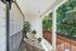Balcony, wicker chairs, potted plants