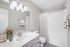 Virtual staging of bathroom with quartz style counter tops