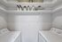 Full-size washer and dryer and wall shelving