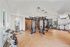 fitness center with multi use machines and free weights