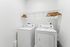Utility room with full size washer and dryer