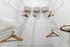 Walk in closet with hangers and rack shelves