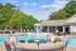 Expansive pool with fountain features