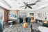 Clubhouse with contemporary decor, featuring stylish chairs, geometric patterns, and vibrant art, ideal for social gatherings.