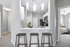 Contemporary apartment interior with a sleek kitchen, inviting bar area, and glimpses of a cozy bedroom, perfect for modern living.