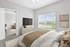 Bright and airy bedroom with a large window, elegant decor, and cozy bedding, offering a view into a stylish living area.