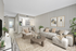 Stylish open-concept living room with modern decor, featuring a cozy gray sofa, elegant armchair, and chic kitchen with bar seating.