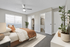 Bright and cozy bedroom with modern ceiling fan, large window, and ample closet space, perfect for comfort and style.