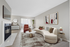 Sophisticated living room with modern curved sofa, abstract art, and cozy fireplace, ideal for stylish relaxation.